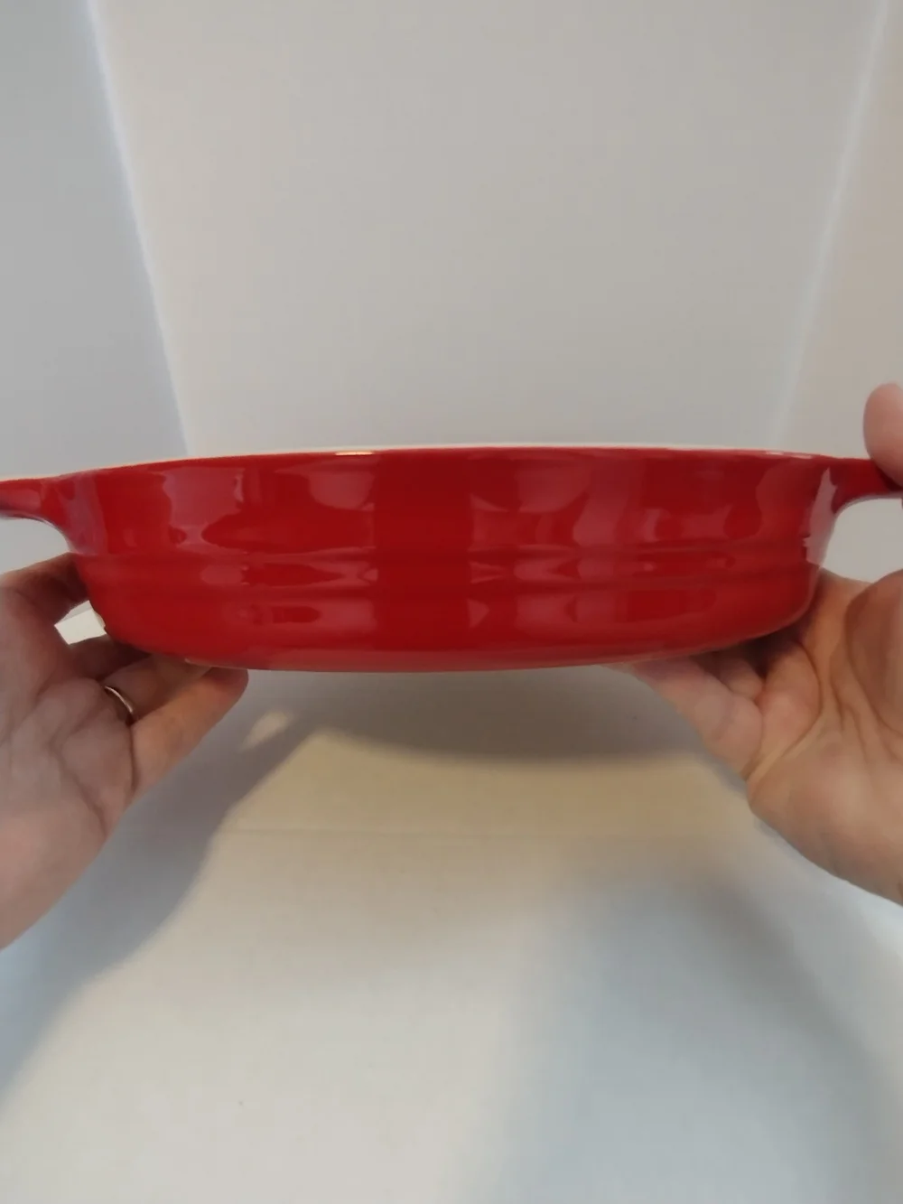 Le Creuset Red Ceramic Oval Baking Dish with Cream Interior